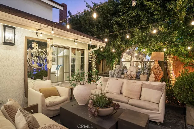a view of entryway livingroom and hall with wooden floor