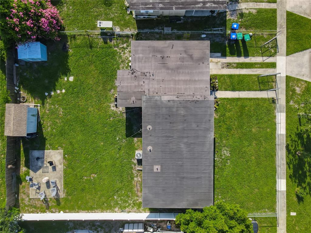 7033 Lakner Way Orlando, FL 32822 - Photo 30 of 31 an aerial view of a house with a yard