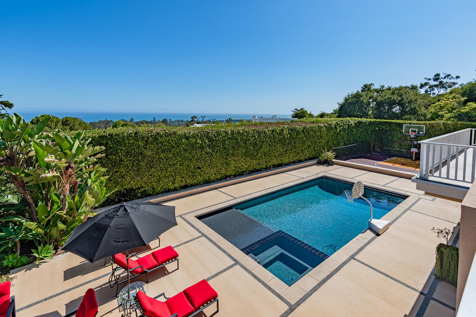 a view of a two chairs in the roof deck
