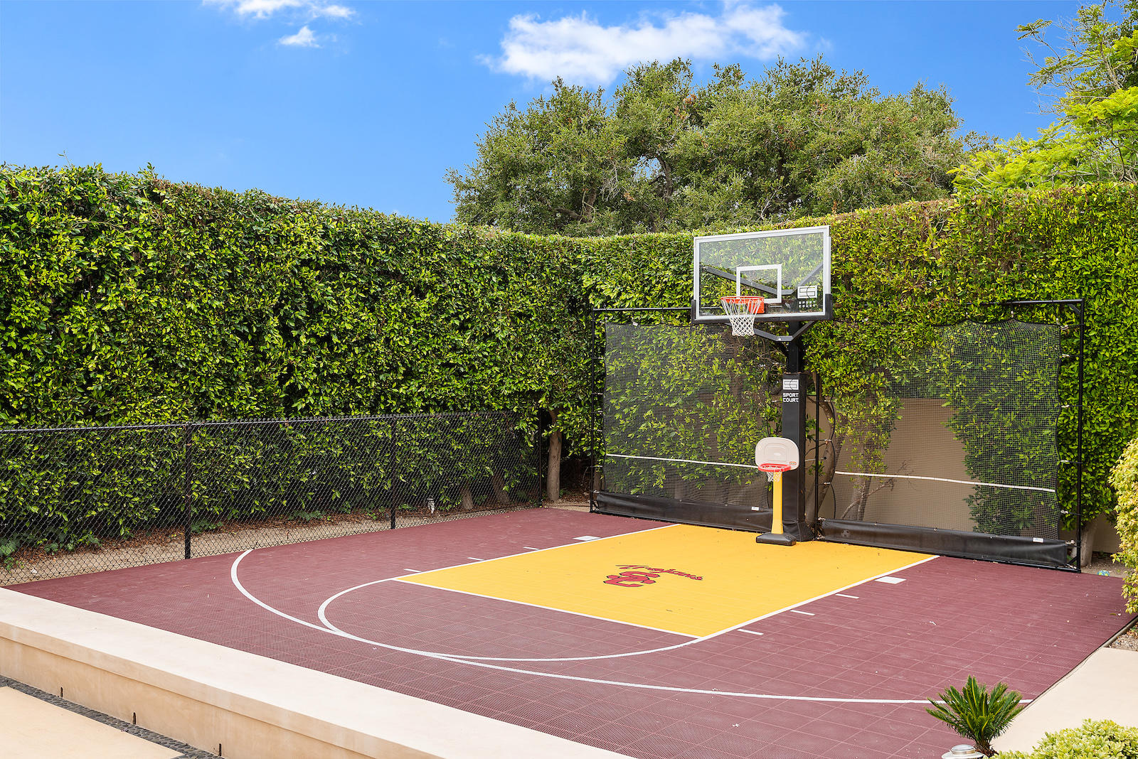 1171 Glenview Road Santa Barbara, CA 93108 - Photo 16 of 19 a view of a tennis ground with large trees