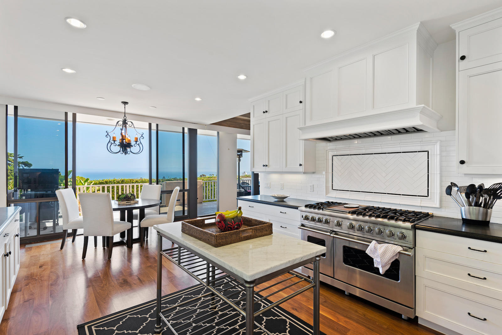 1171 Glenview Road Santa Barbara, CA 93108 - Photo 5 of 19 a kitchen with a stove a table and chairs in it