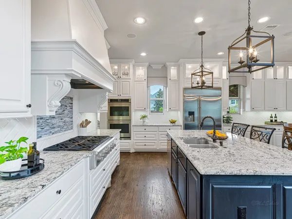 a kitchen with granite countertop lots of counter top space