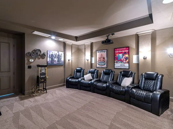 a view of a workspace with furniture and a potted plant