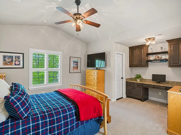 a view of a patio with couches chairs and a barbeque