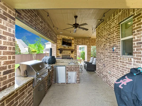a swimming pool with outdoor seating and yard