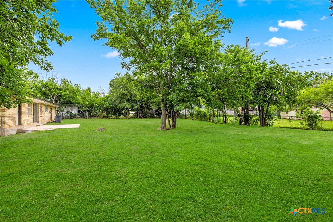 1609 Linwood Road Temple, TX 76502 - Photo 25 of 25 a view of green field with trees in the background