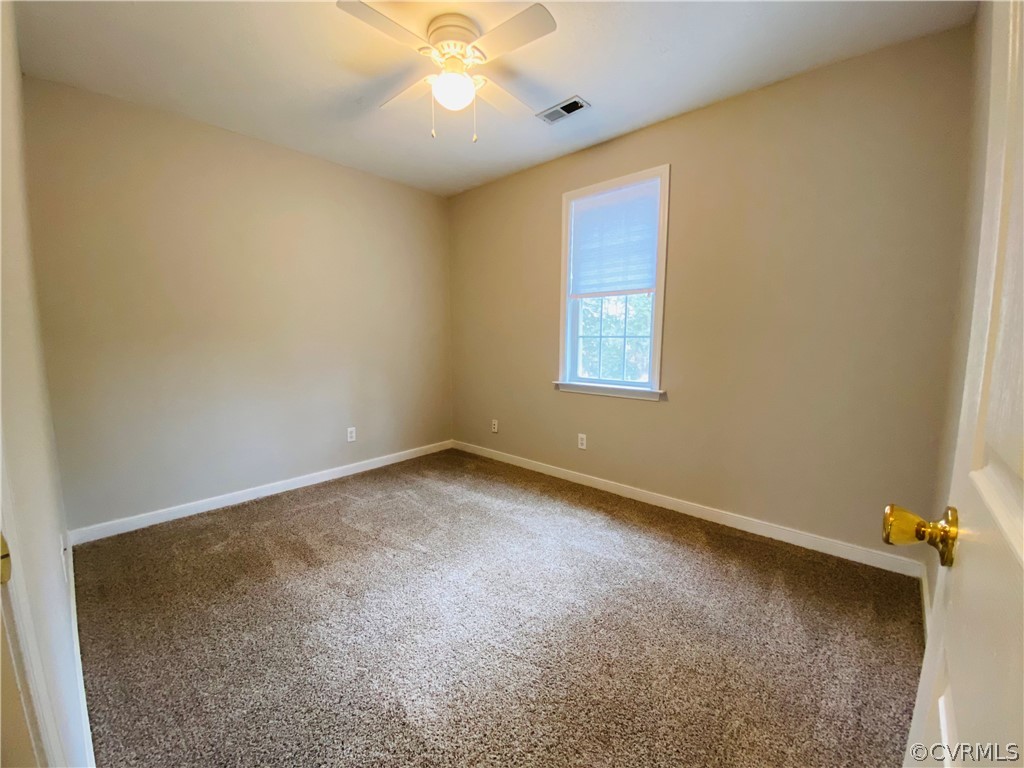 6956 Fox Drive Prince George, VA 23875 - Photo 18 of 26 an empty room with a window