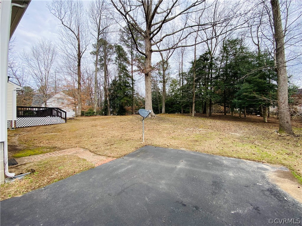6956 Fox Drive Prince George, VA 23875 - Photo 22 of 26 a view of road with large trees