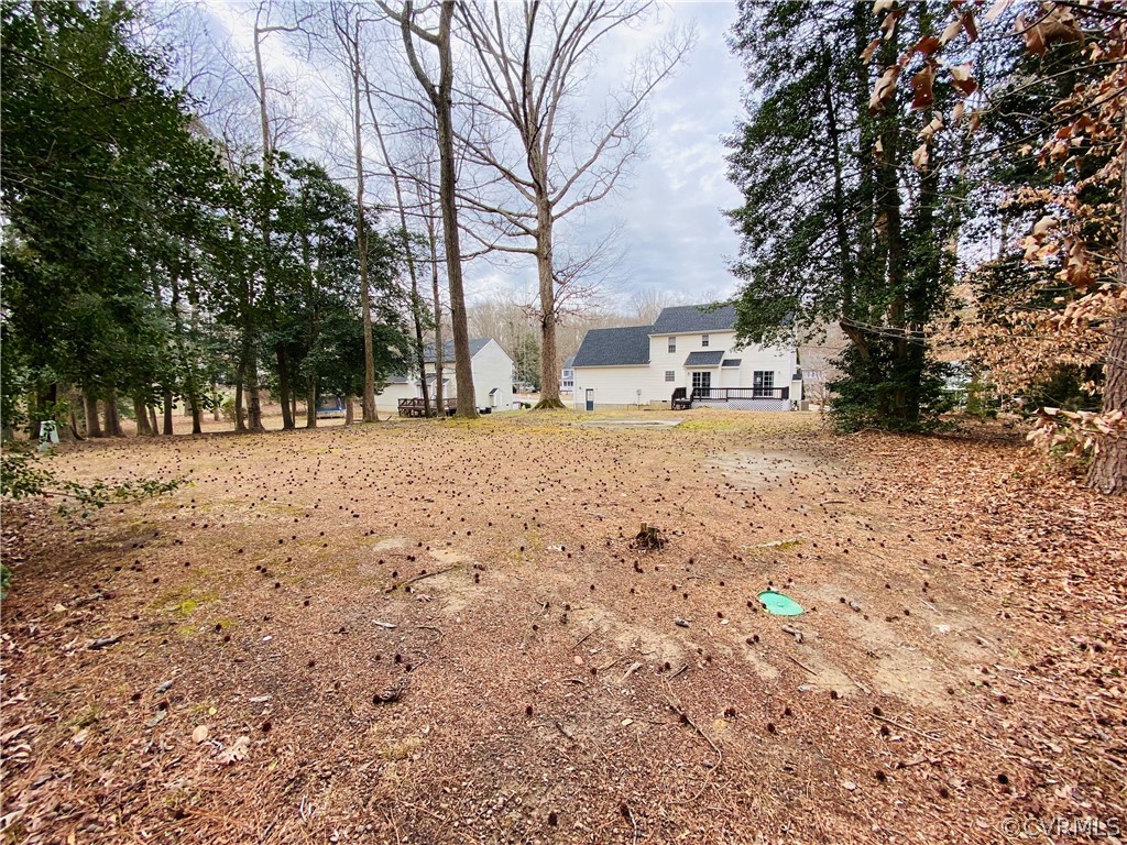 6956 Fox Drive Prince George, VA 23875 - Photo 25 of 26 a view of a yard covered in snow
