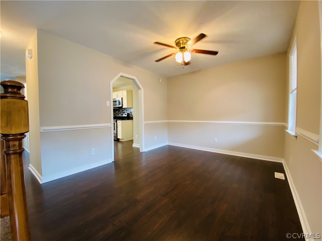 6956 Fox Drive Prince George, VA 23875 - Photo 6 of 26 wooden floor in an empty room with a window
