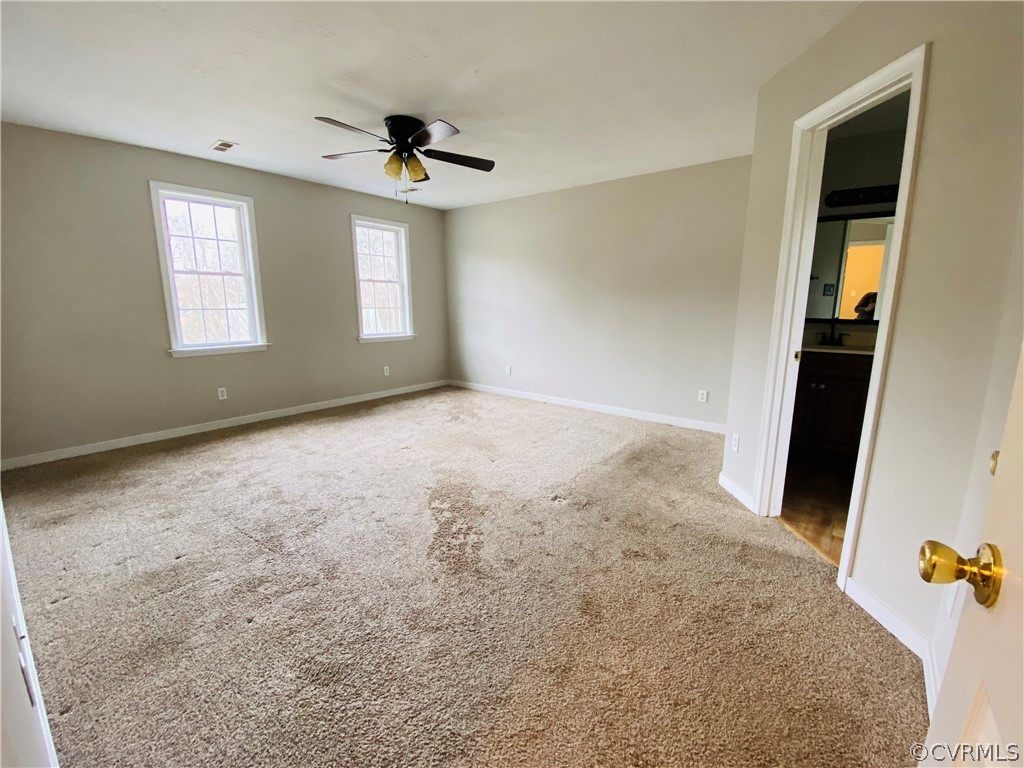 6956 Fox Drive Prince George, VA 23875 - Photo 9 of 26 wooden floor in an empty room with a window