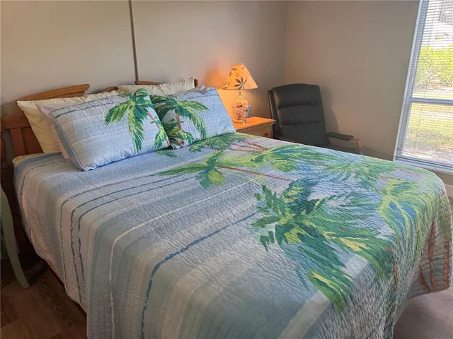 a bathroom with a toilet a sink and a mirror