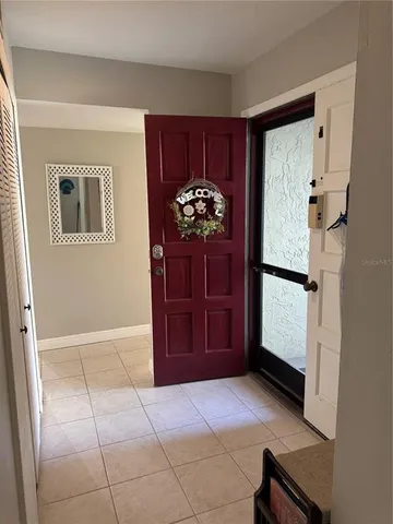a living room with furniture and a gate