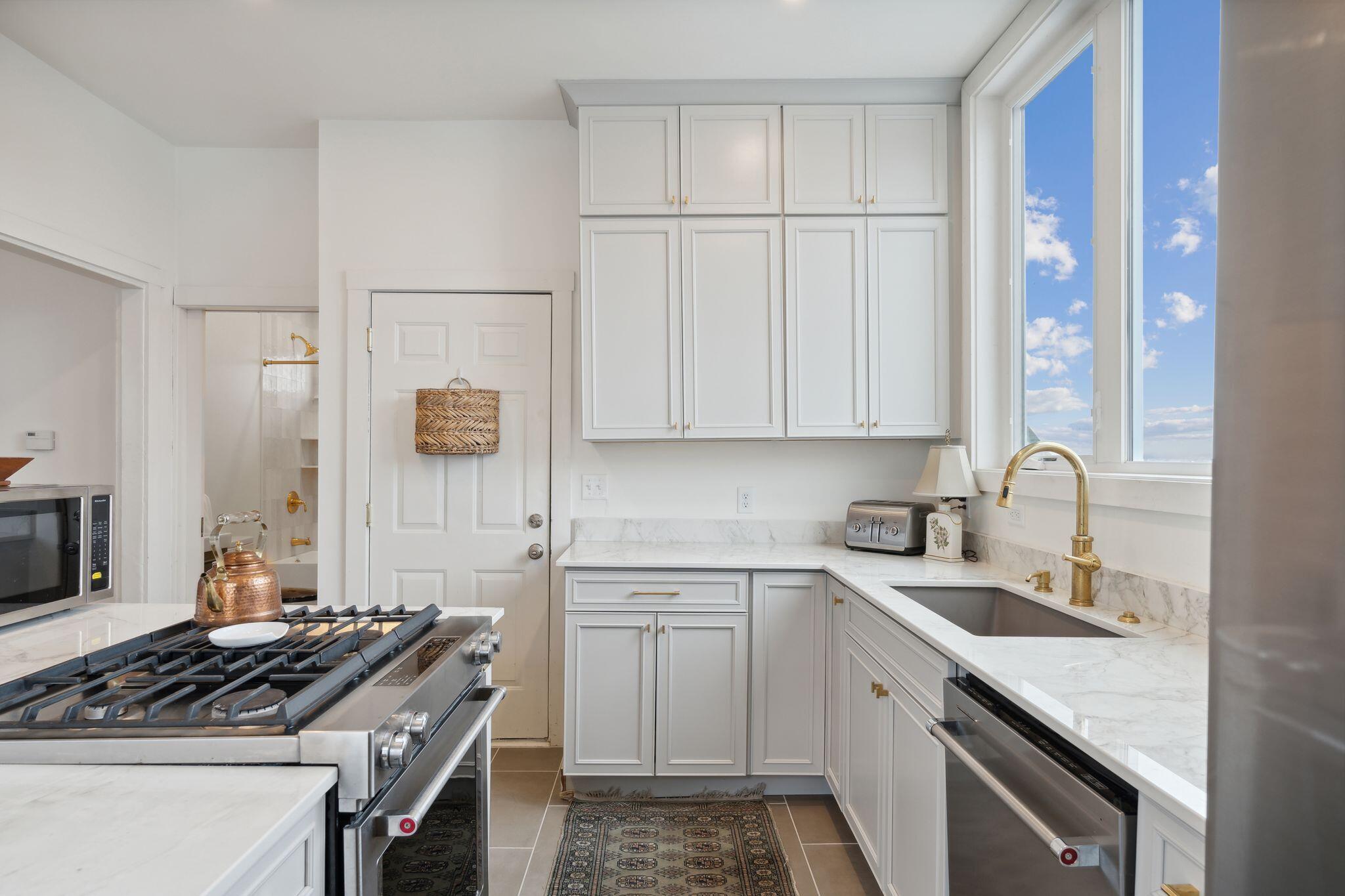 Sunny kitchen with views of Casco Bay