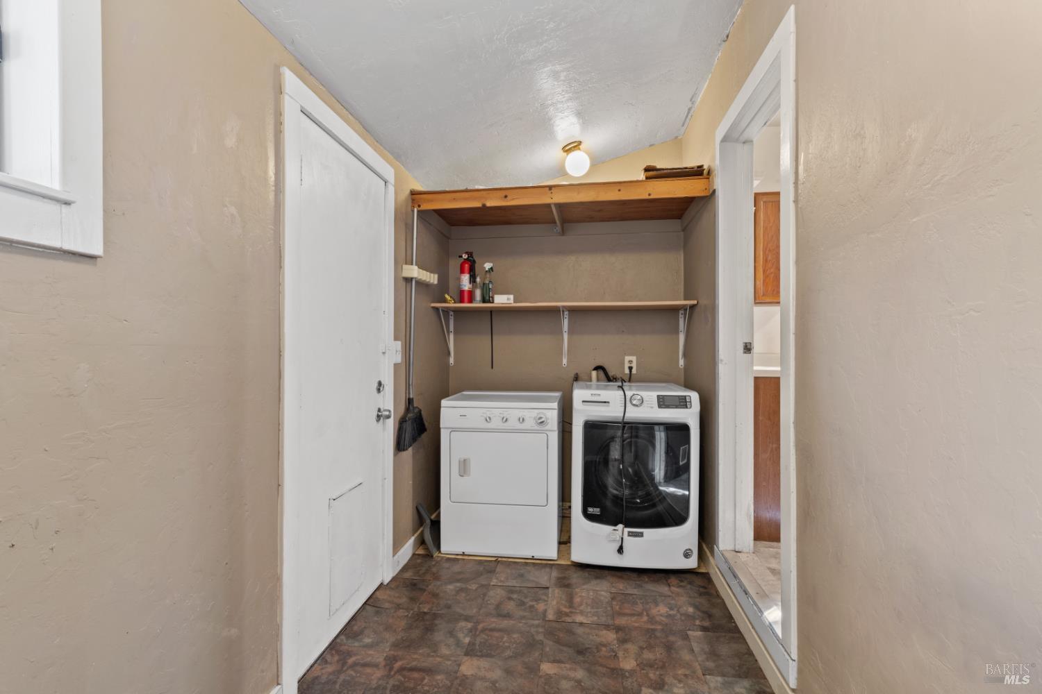 227 Hewett Street Santa Rosa, CA 95401 - Photo 29 of 65 Laundry room in Hewett with washer/dryer