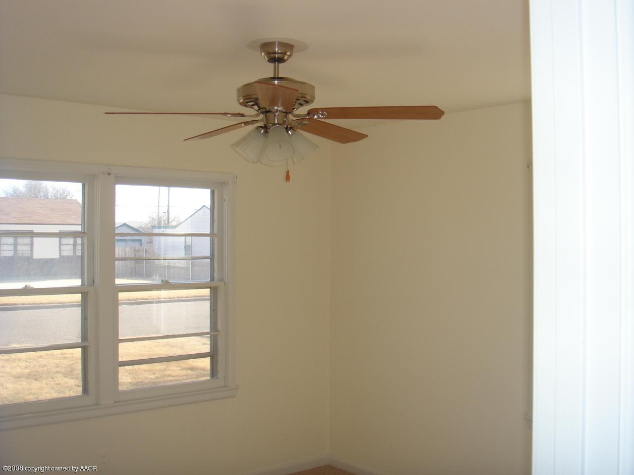 4300 South Hayden Street Amarillo, TX 79110 - Photo 5 of 10 a view of a small space with a fan