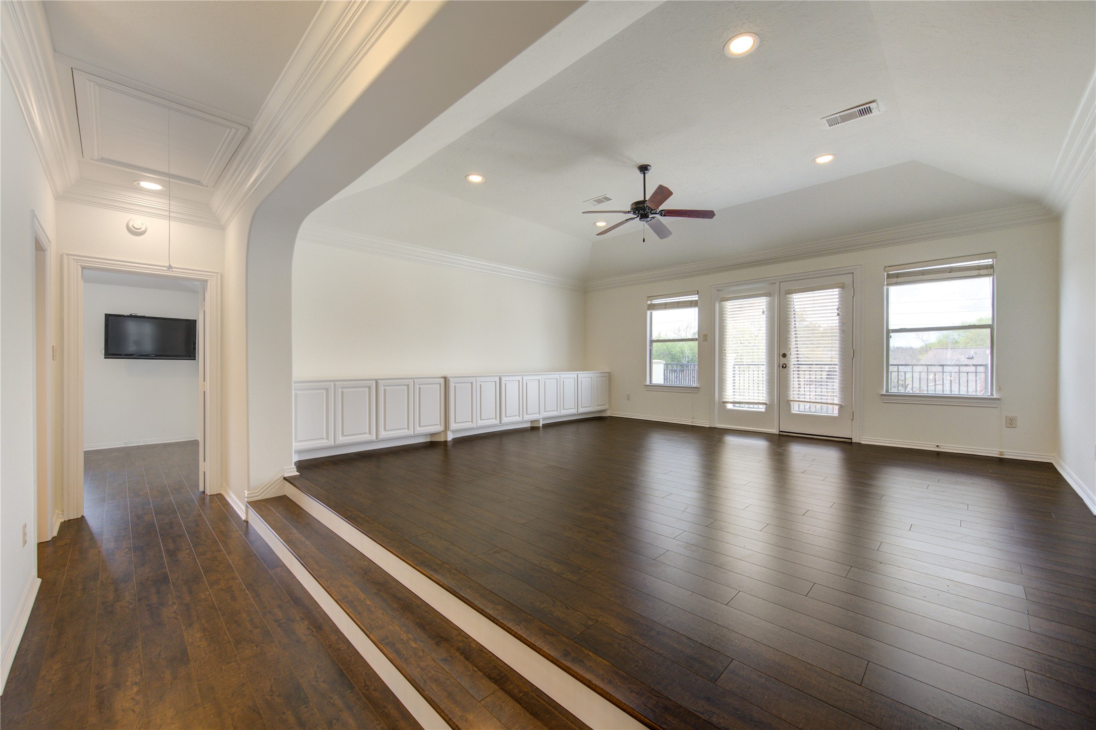 14014 Hampton Cove Drive Houston, TX 77077 - Photo 29 of 47 Expansive game room with access to a balcony overlooking the pool and no rear neighbors, offering ultimate privacy.