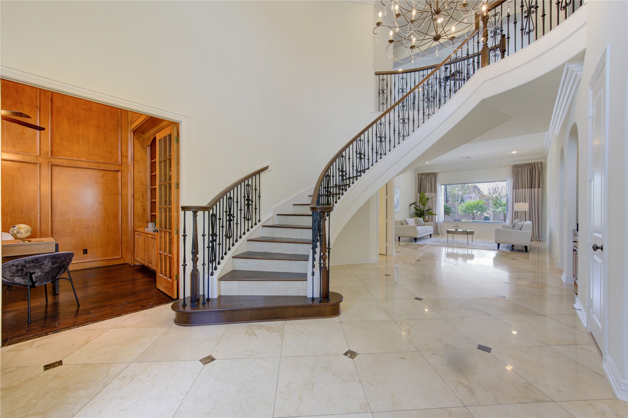 14014 Hampton Cove Drive Houston, TX 77077 - Photo 6 of 47 Elegant foyer with custom flooring, creating a refined and welcoming first impression.