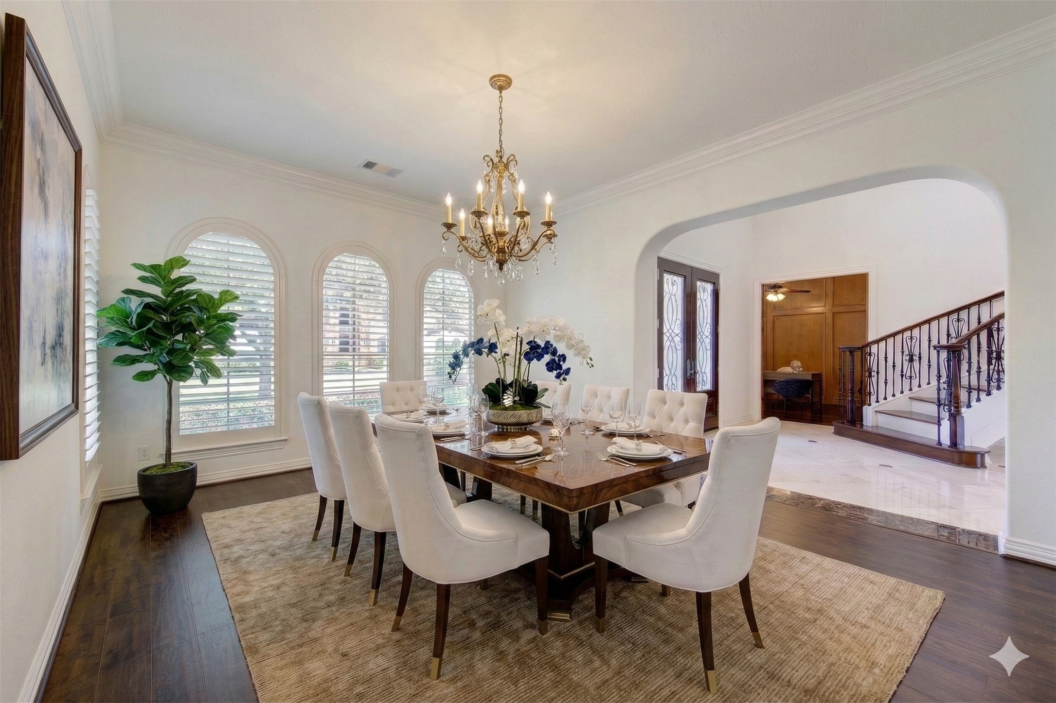 14014 Hampton Cove Drive Houston, TX 77077 - Photo 9 of 47 Large dining area with direct kitchen access, filled with natural light from custom windows with elegant shutters.