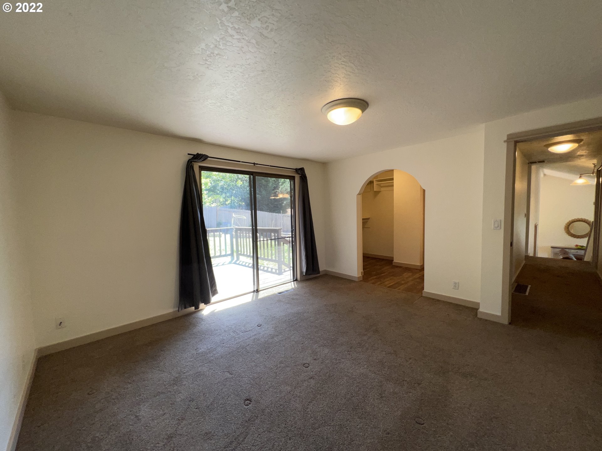 361 South 68th Place Springfield, OR 97478 - Photo 23 of 32 an empty room with windows and closet