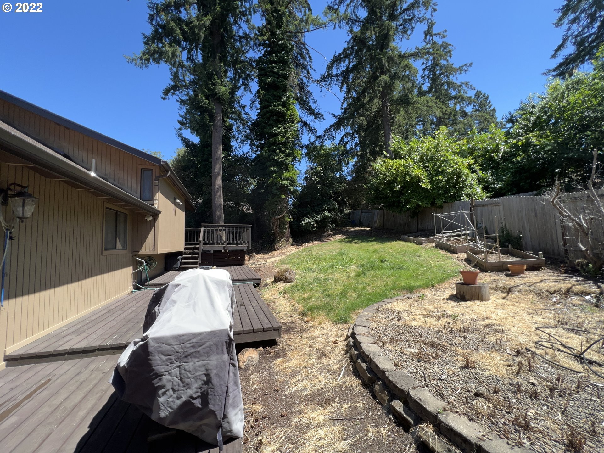 361 South 68th Place Springfield, OR 97478 - Photo 6 of 32 a view of a backyard with sitting area