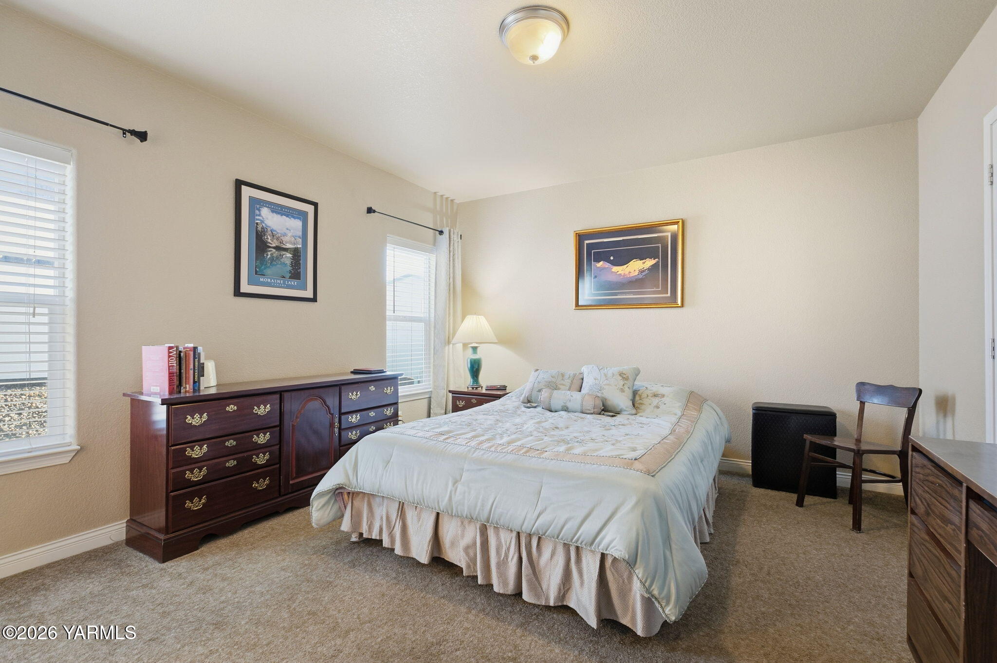 200 Bridle Way, Unit 165 Yakima, WA 98901 - Photo 18 of 21 a bedroom with a bed a desk and chair