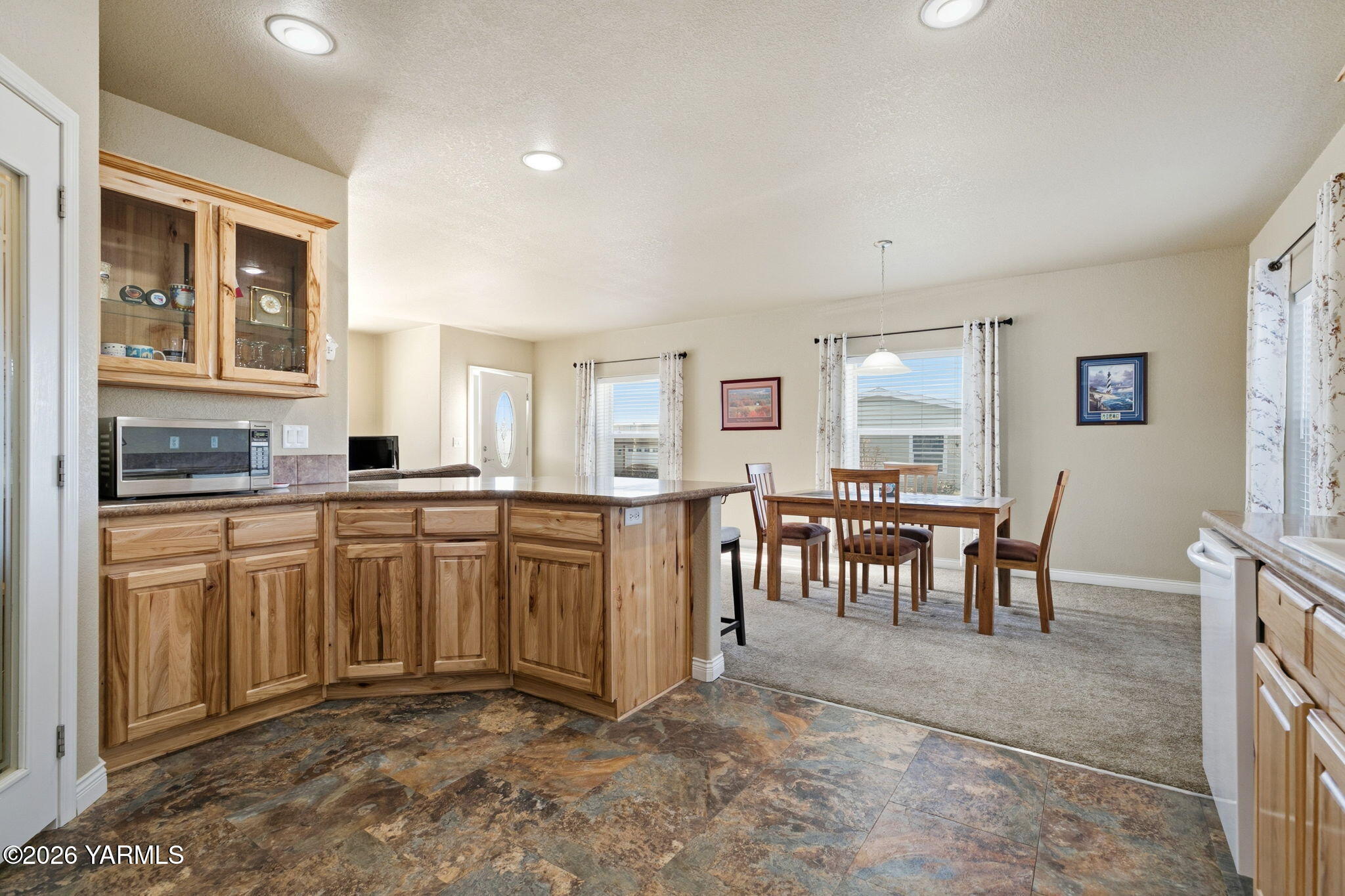 200 Bridle Way, Unit 165 Yakima, WA 98901 - Photo 6 of 21 a kitchen with sink and refrigerator