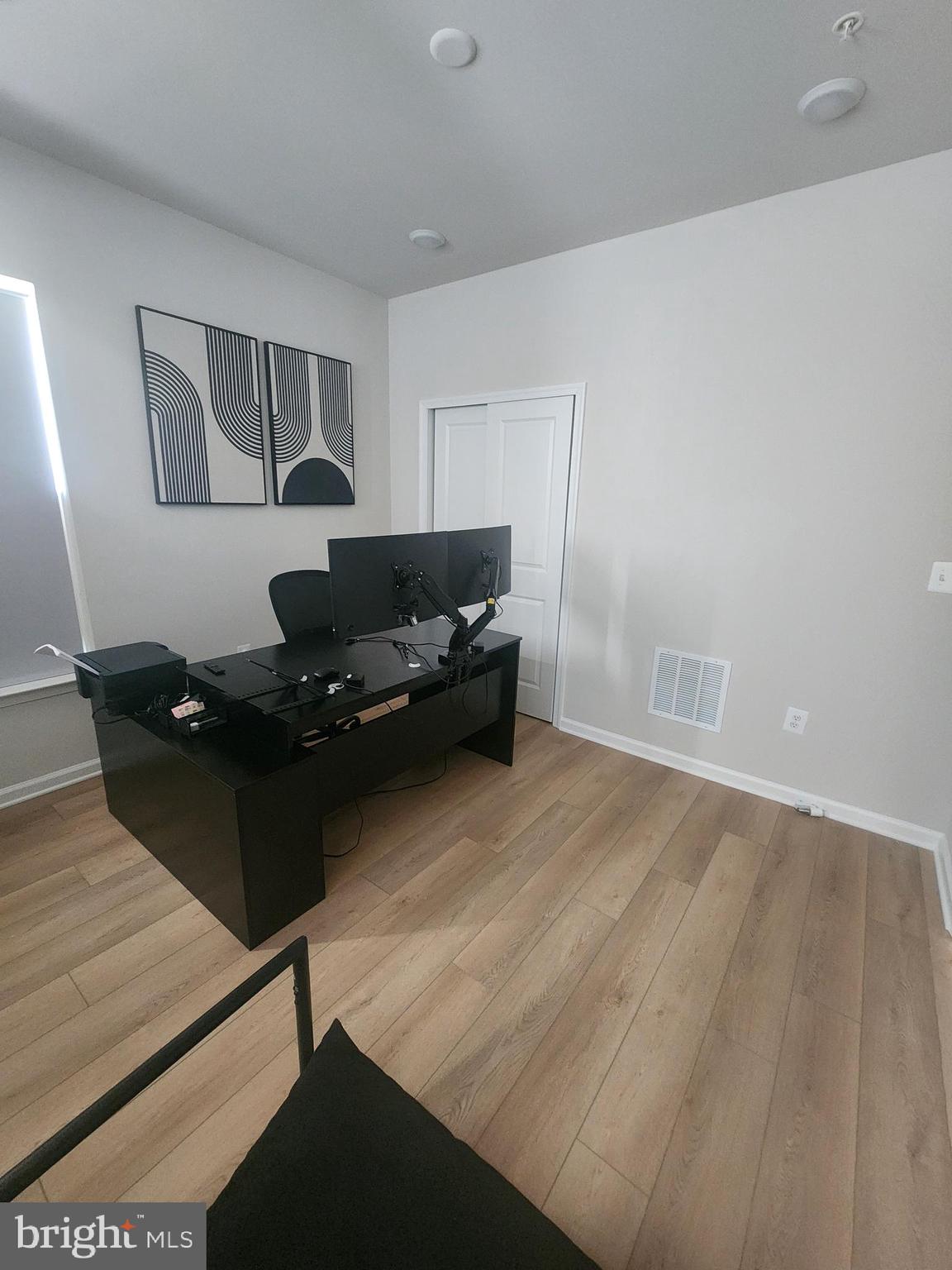 234 Mainstream Drive Laurel, MD 20724 - Photo 11 of 40 a living room with furniture and a window