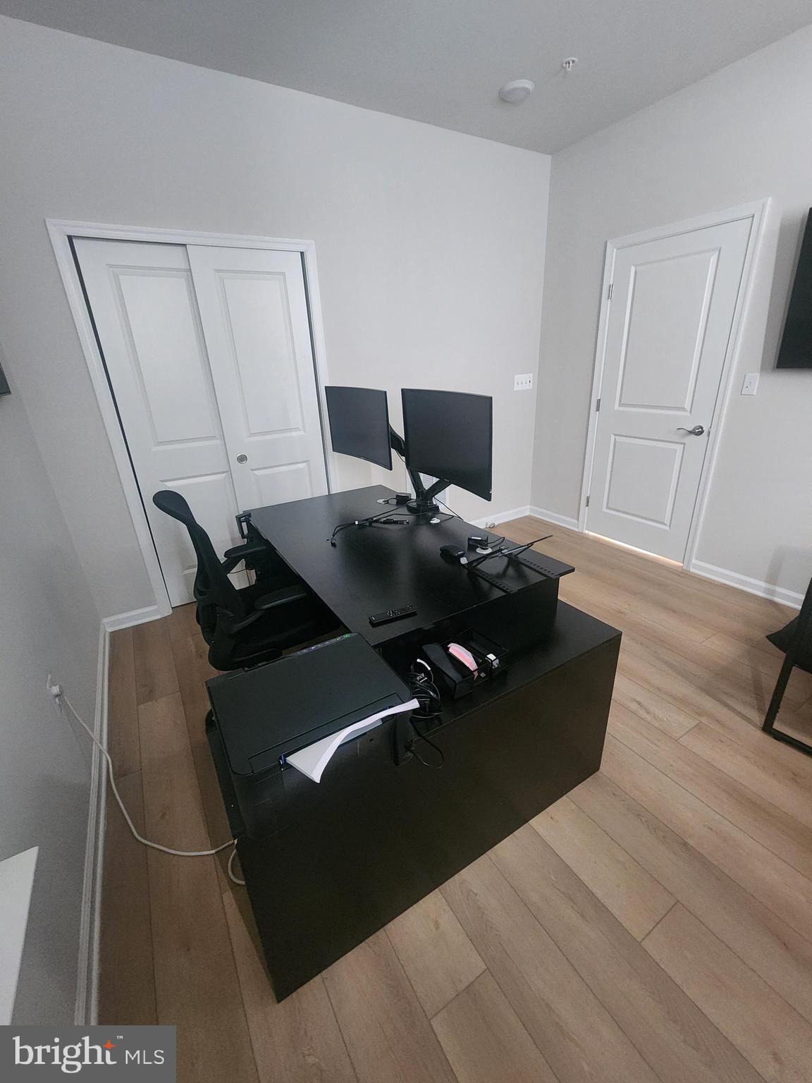 234 Mainstream Drive Laurel, MD 20724 - Photo 12 of 40 a living room with furniture and a flat screen tv