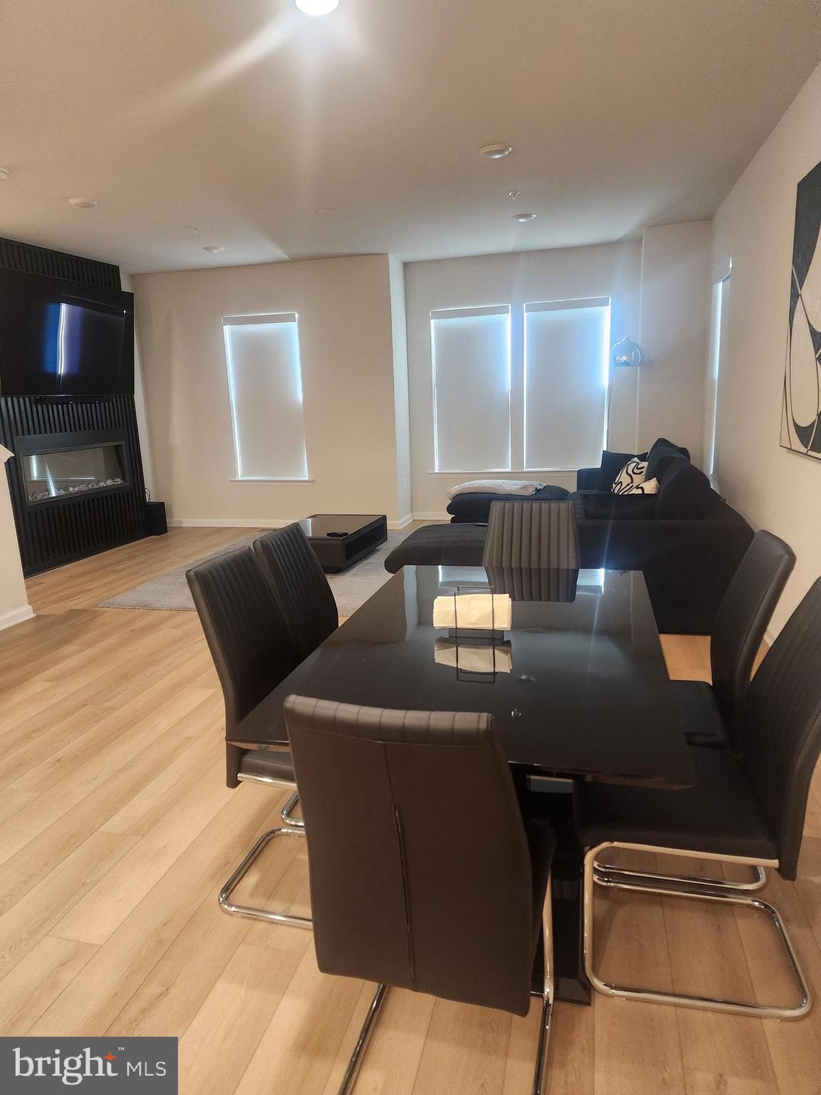 234 Mainstream Drive Laurel, MD 20724 - Photo 27 of 40 a view of a dining room with furniture