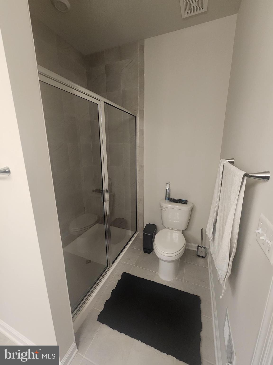 234 Mainstream Drive Laurel, MD 20724 - Photo 34 of 40 a bathroom with a shower and a toilet