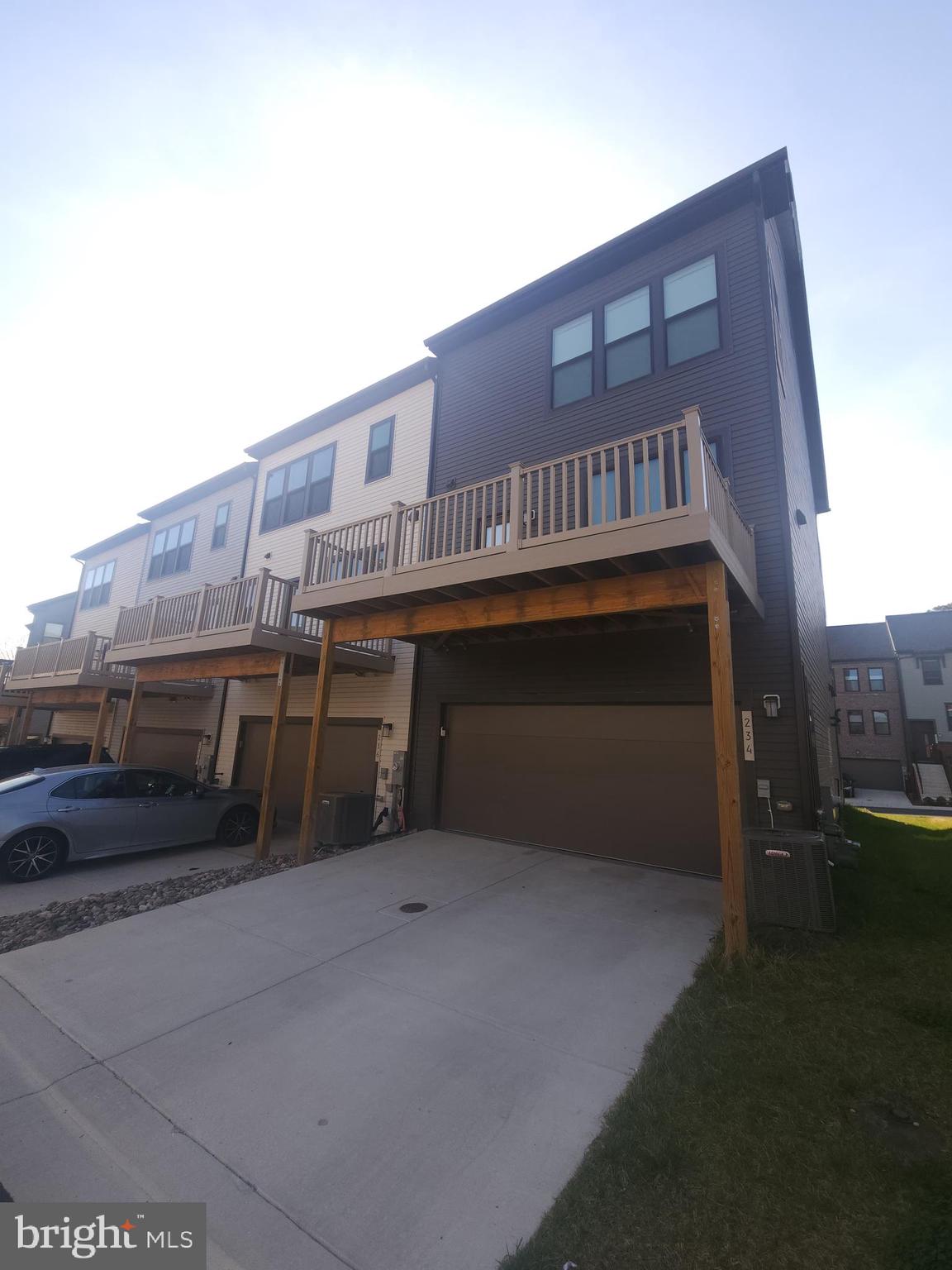 234 Mainstream Drive Laurel, MD 20724 - Photo 5 of 40 a balcony with an outdoor space