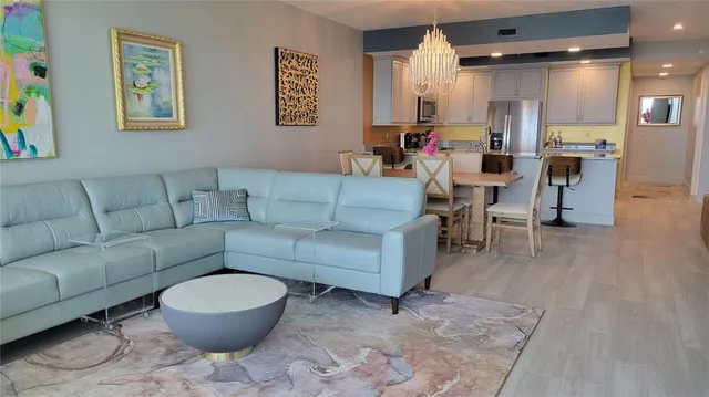 a living room with furniture and a rug