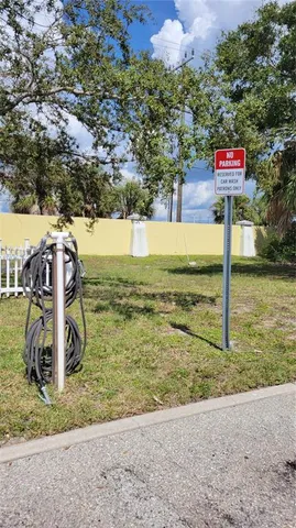 a view of balcony with wooden floor and fence