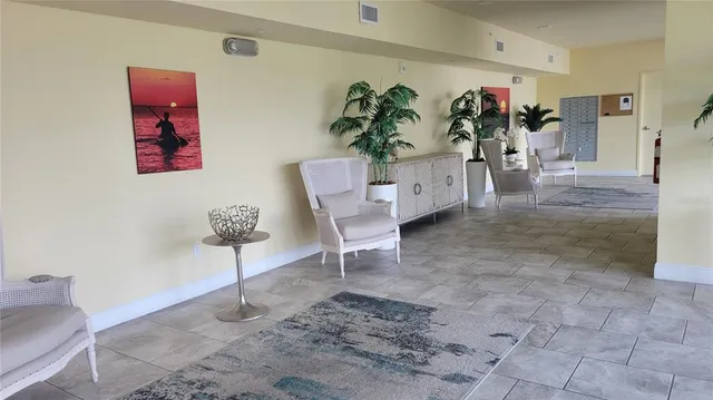 a view of a pool with wooden floor