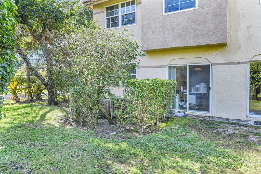 6693 Via Regina, Unit 6693 Boca Raton, FL 33433 - Photo 5 of 27 a house view with a garden space