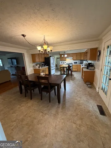 a view of a livingroom with furniture and window