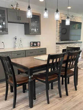 a view of a dining room with furniture