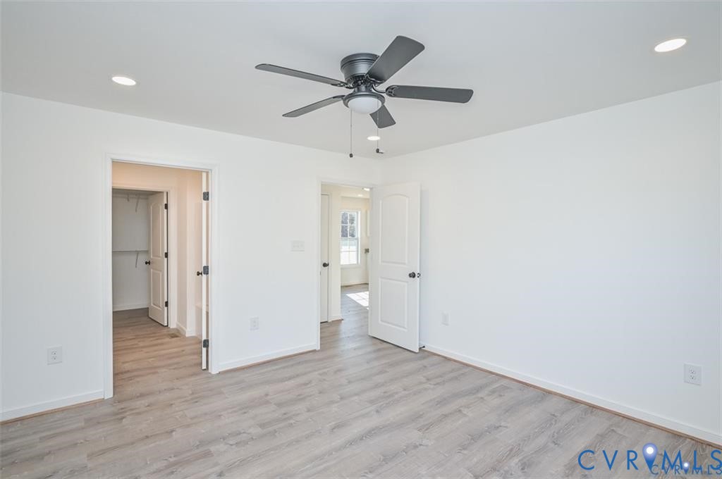 Lot 276 Norway Road Ruther Glen, VA 22546 - Photo 14 of 36 a view of an empty room and wooden floor