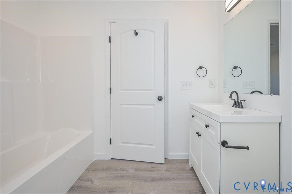 Lot 276 Norway Road Ruther Glen, VA 22546 - Photo 17 of 36 a bathroom with a bathtub and sink
