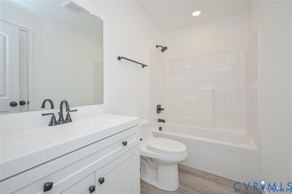 Lot 276 Norway Road Ruther Glen, VA 22546 - Photo 31 of 36 a bathroom with a sink a toilet and shower