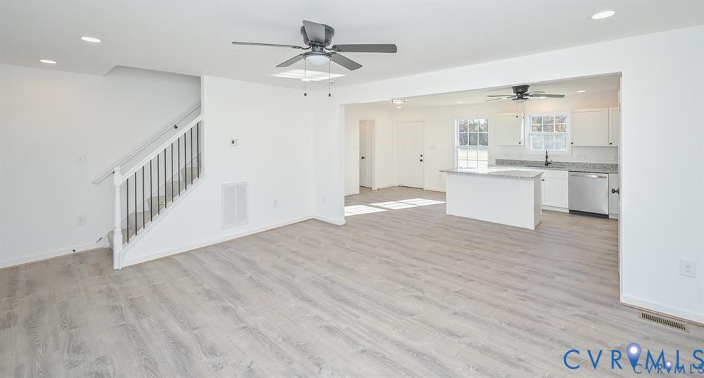 Lot 276 Norway Road Ruther Glen, VA 22546 - Photo 5 of 36 a view of a kitchen with wooden floor and a sink