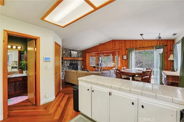 a very nice looking living room with a large window