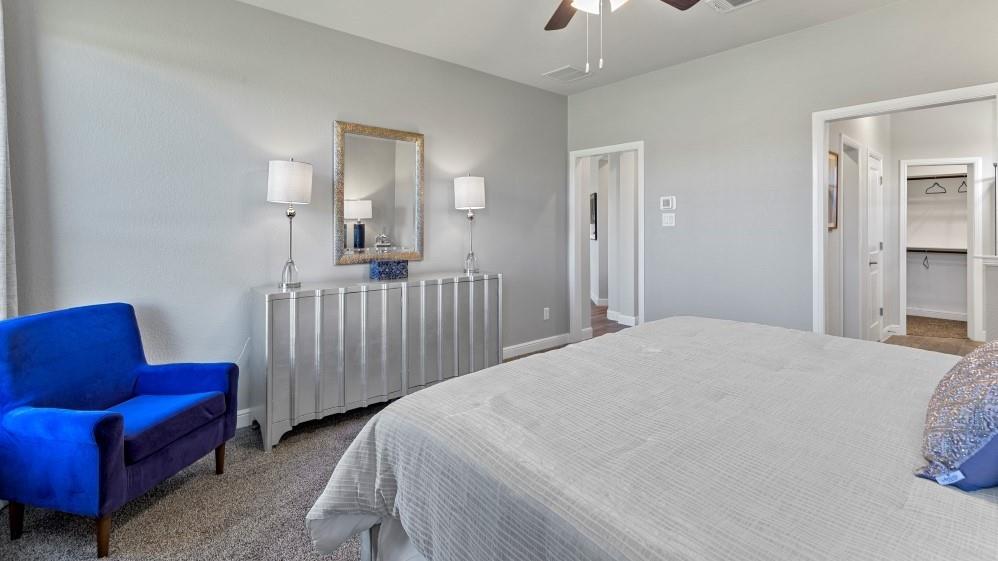 111 Stanton Avenue Rhome, TX 76078 - Photo 14 of 30 a bedroom with a bed and a couch