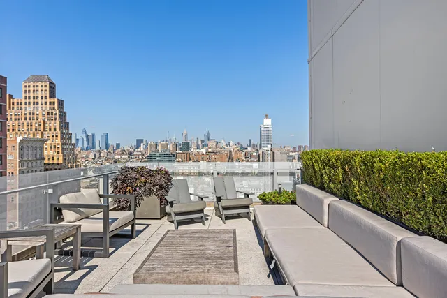 a view of a balcony with wooden floor