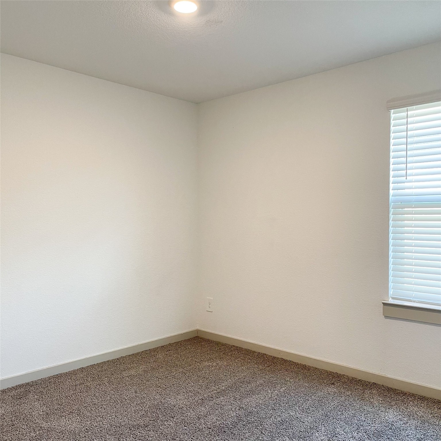 6814 Bradford Terrace Road Richmond, TX 77407 - Photo 18 of 31 an empty room with a window