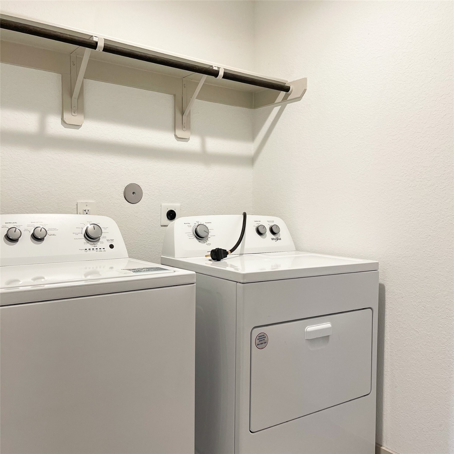 6814 Bradford Terrace Road Richmond, TX 77407 - Photo 19 of 31 a utility room with dryer and washer