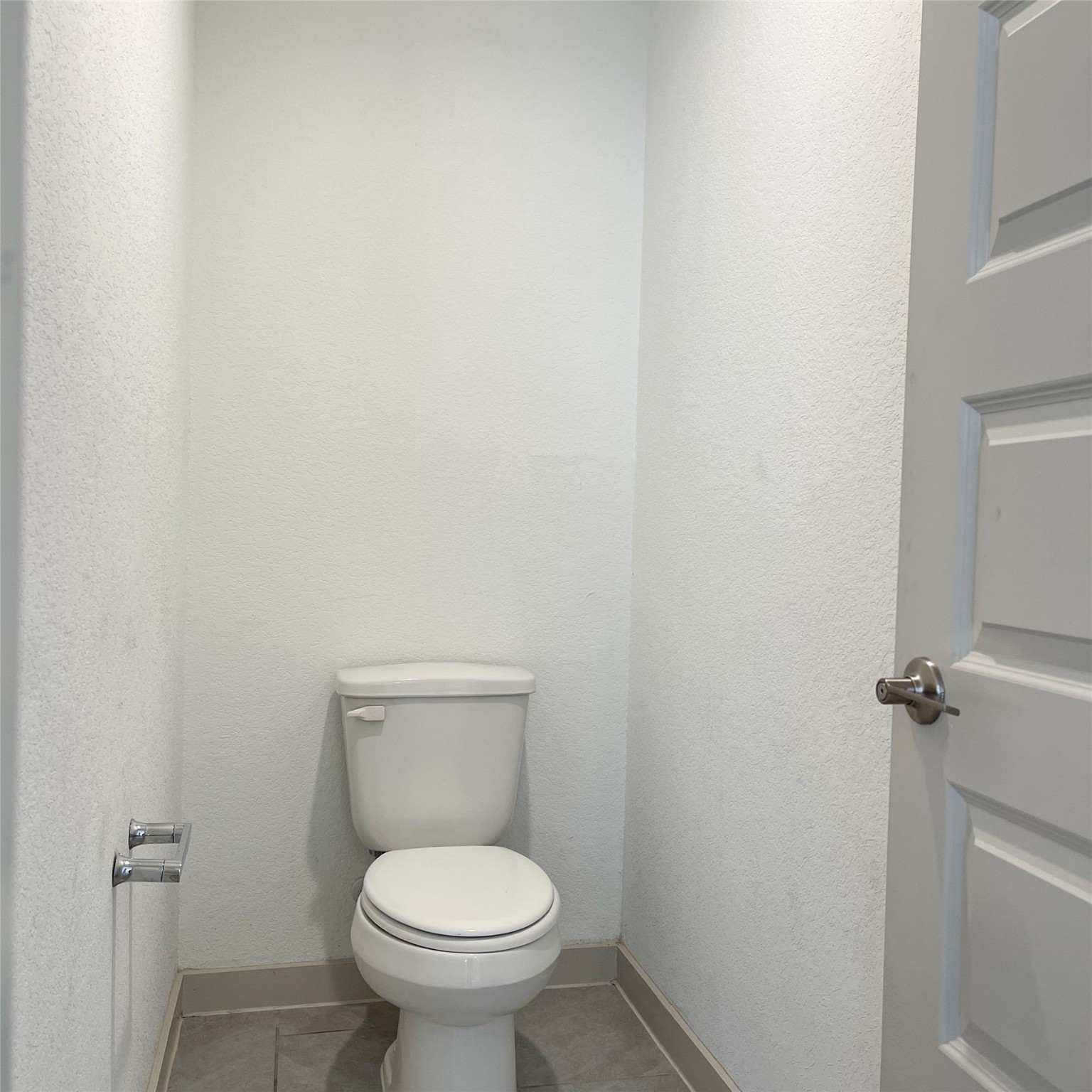 6814 Bradford Terrace Road Richmond, TX 77407 - Photo 24 of 31 a white toilet sitting in a bathroom