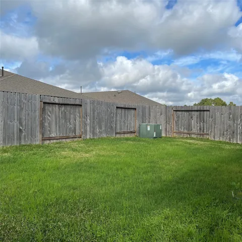 a brick house with a large windows