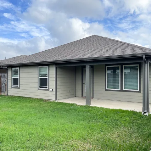 a view of a house with a garden